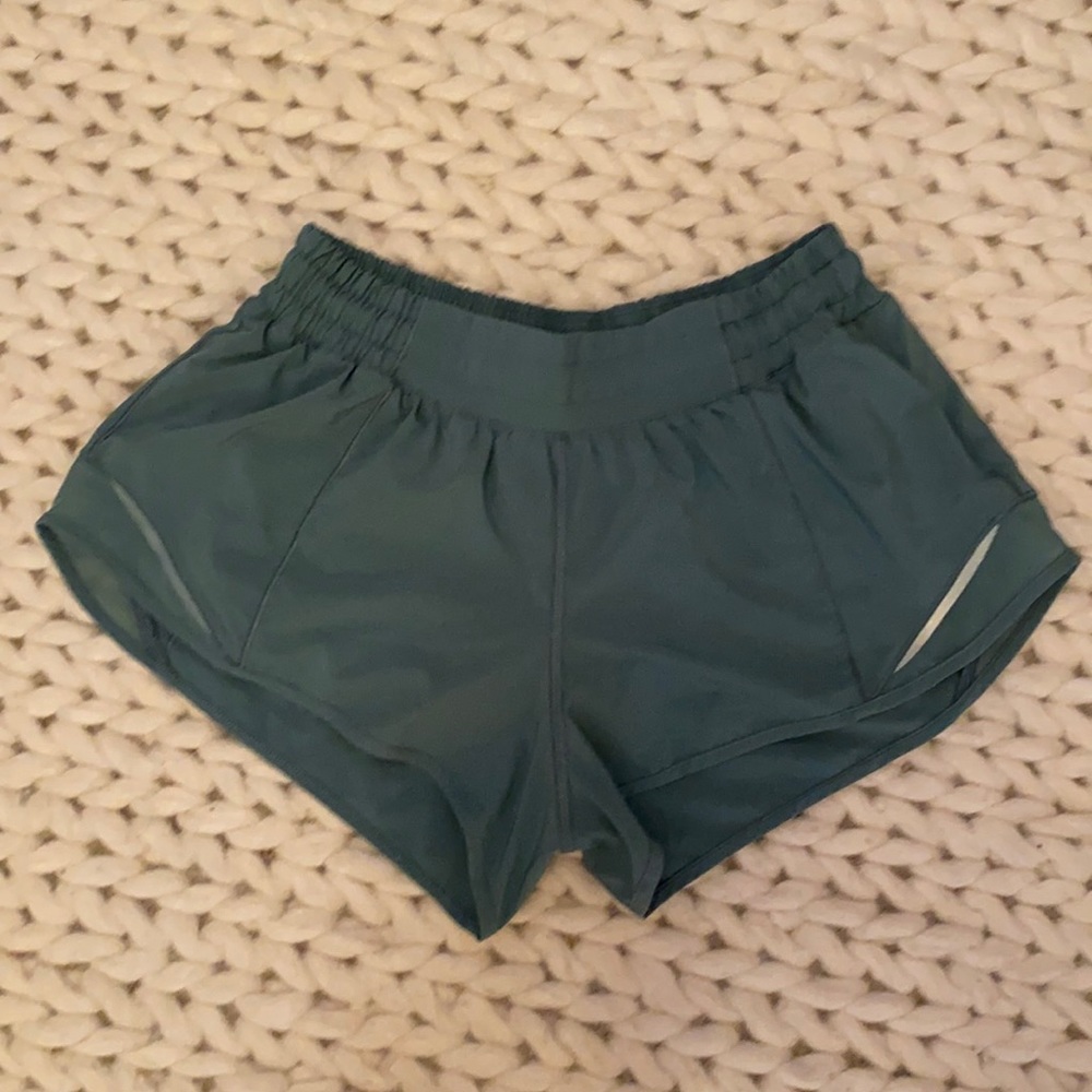 Women’s Lulu green(teal) workout short with liner. Size 6, good condition,